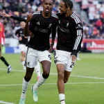 Liverpool Beat Brentford 2-1 but Szoboszlai and Frimpong Suffer Injuries